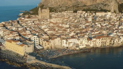 Flying over Cefalu during sunset in Island of Sicily Italy 4K Stock Footage 162950150