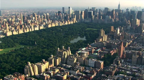Flying over Central Park toward Manhattan skyline. Shot in 2003. Stock Footage