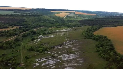 Flying over chalk hills forests and fields Vidéo 134350115