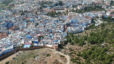 Flying over Chefchaouen and a blue city in Morocco with Drone from above (Aerial 스톡 동영상 101342648