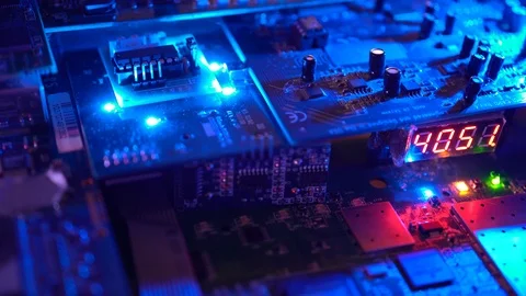 "Flying" over a circuit board loaded with LED's and flashing lights Video stock 89088642