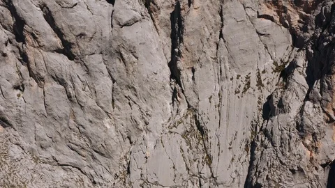Flying over a cliff over cliffs in austria Stock Footage 128598183