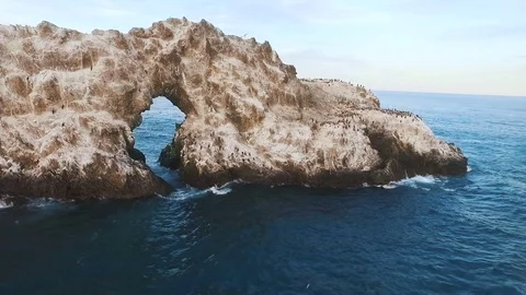 Flying over the cliff into the sea. Span on the copter in the sea. Background Stock Footage 73248763