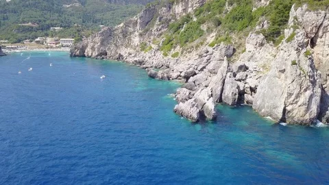 Flying over the cliff on a sunny beach Aerial view Stock Footage 80335492