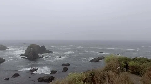 Flying over the cliff towards ocean Video stock 82076566