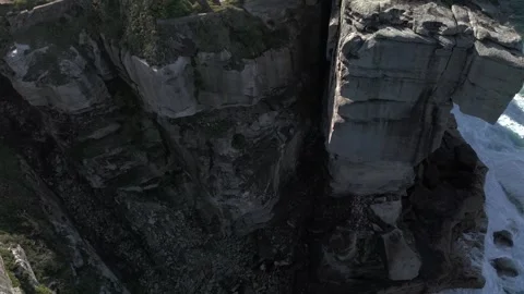 Flying over cliffs and sea from top down aerial view. Stock Footage 337000247