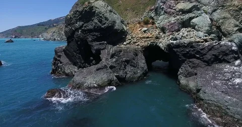 Flying over the cliffs at Big Sur, California Stock Footage 76483414