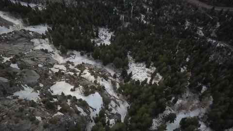 Flying over cliffs to forest floor 스톡 동영상 123392461