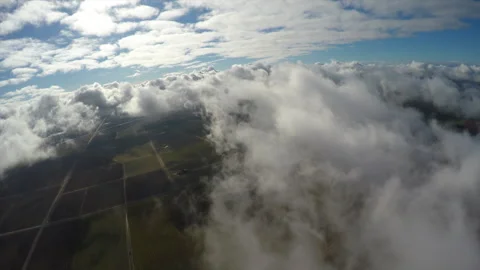 Flying over cloud covered farm lands northern California Stock Footage 240416718