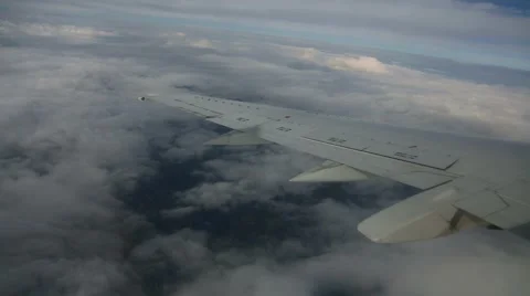 Flying over clouds with a aircraft Stock Footage 63798134