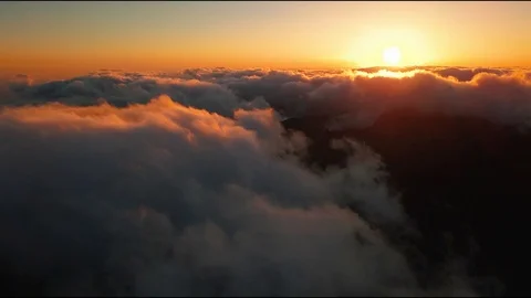 Flying Over The Clouds. Amazing Landscape Of Fog At Sunset - Aerial Drone Footag Stock Footage 103323909