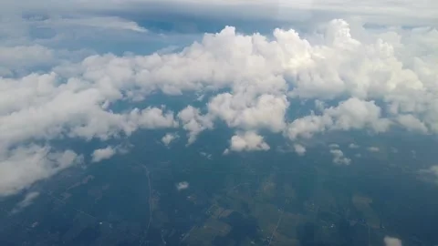 Flying over clouds and fields (Toledo, OH) Stock Footage 169319005