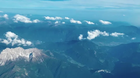 Flying Over The Clouds And Mountains Of Western Europe Stock Footage 146197429