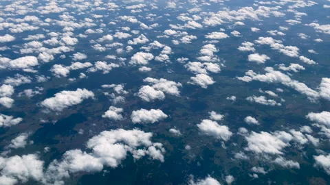 Flying over clouds on a bright day Stock Footage 153786388