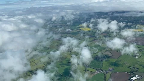 Flying over clouds on a bright day Stock Footage 153786535