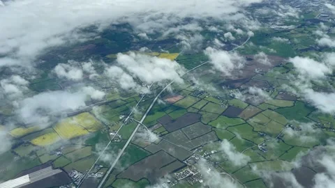 Flying over clouds on a bright day Stock Footage 153786541