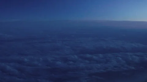 Flying over clouds during Sunset Stockbeeldmateriaal 49412585