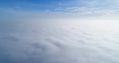 Flying over clouds of fog Stock Footage 100875299