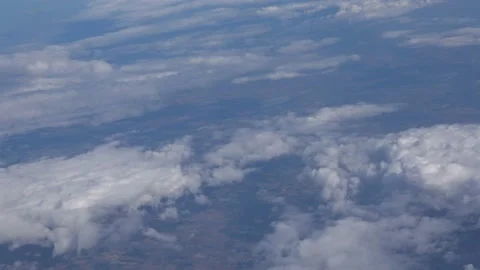 Flying over the clouds Stockbeeldmateriaal 141615412