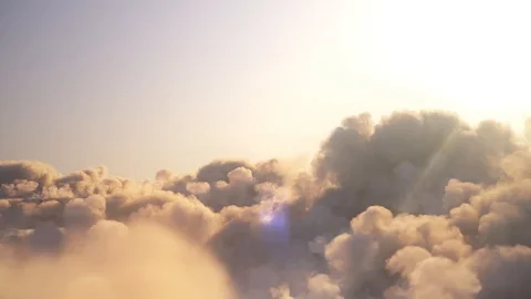 Flying over the clouds with the late sun - looping with alpha mask Stock Footage 107058827