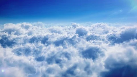 Flying over the clouds. Loopable animation. Stock Footage 80864897