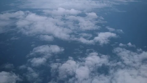 Flying over the clouds. Nice view of the sea. Clouds. A ship in the sea. Aerial  Stock Footage 84146108