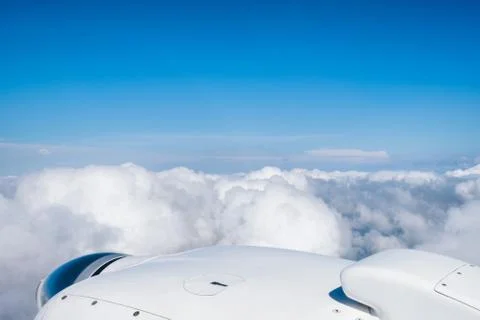 Flying over the clouds. Stock Photos