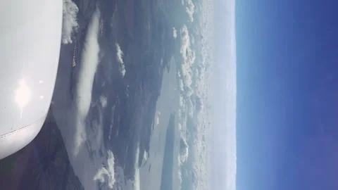 Flying over the clouds in a plane aircraft Stock-Footage 91154447