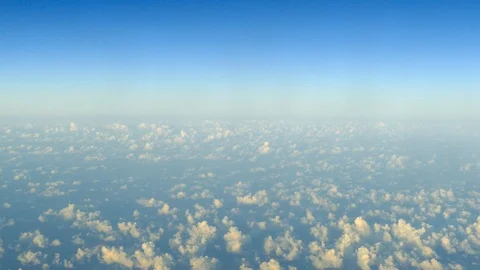 Flying Over The Clouds, showing Earth's atmosphere. Video stock 95982454