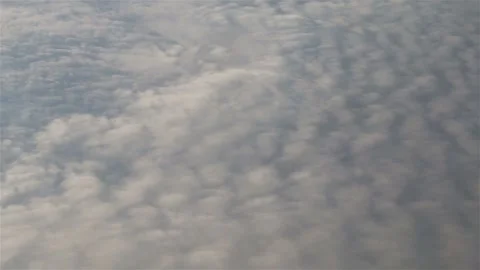 Flying over clouds in the sky Stock Footage 164179283