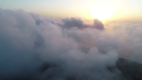 Flying over the clouds at sunset - 2 Video stock 145875718