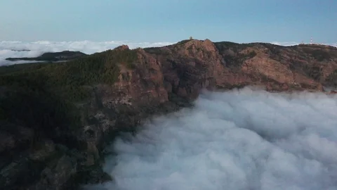Flying over the clouds towards the observatory 2 Video stock 121531196