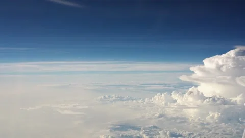 Flying over clouds. View from the window seat of the plane, Airplane fligh Stock Footage 259884675
