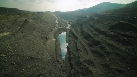 Flying over a coal quarry Stock Footage 145291556