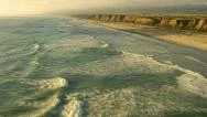Flying Over Coast And Waves At Sunset, Aerial Shot Stock Footage