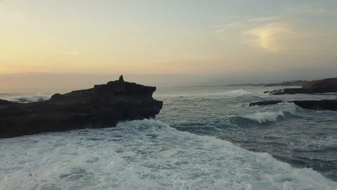 Flying over the coast during the surf Stock Footage 123157593