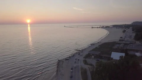 Flying Over Coast Towards Sunset Stock Footage 95559464