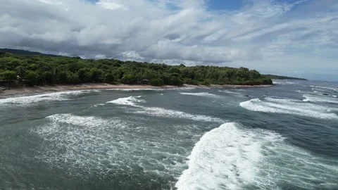 Flying Over Coastal Ocean Beach White Waters in Costa Rica Stock Footage 212170232