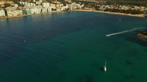 Flying over the coastline and the bay of santa ponsa island of majorca spain Stock Footage 121853154