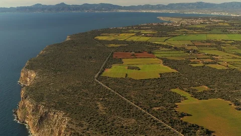 Flying over the coastline and bays of the island of majorca spain Stock Footage 125979176