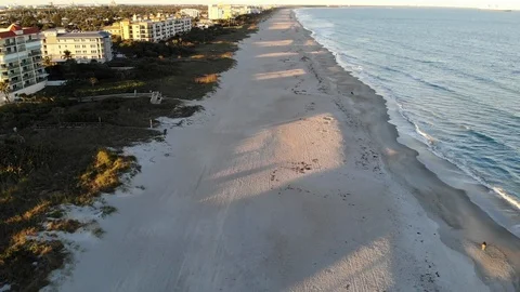 Flying over Cocoa Beach at sunset. Stock Footage 125701413