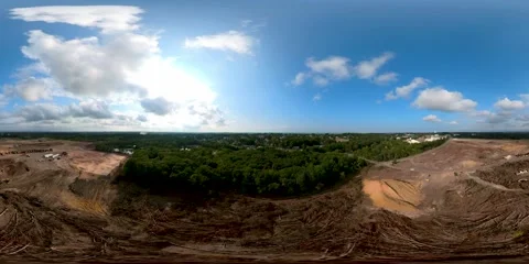 Flying over a construction site with many torn down trees Video stock 213375051