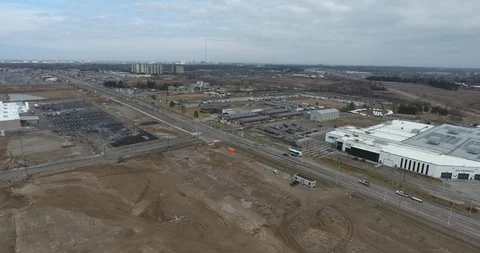 Flying Over Construction Zone Towards Buildings With Solar Panels 4K Vídeos de archivo 88903154
