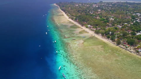 Flying over the coral reef wall on the Indonesian Gili Islands Stock Footage 270043093