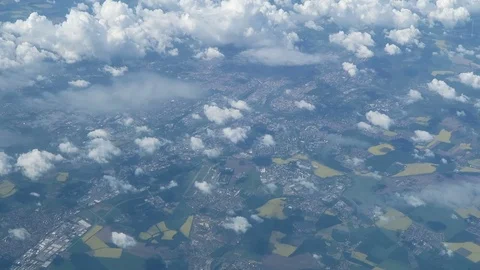 Flying over countryside with fields and cloudscape 스톡 동영상 76927902