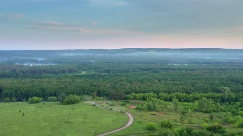 Flying over the countryside at sunset. Stock Footage 116803945