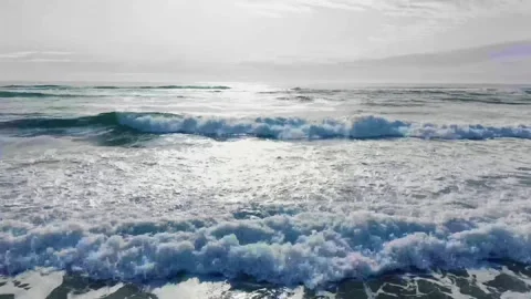 Flying over Crashing Waves Stock Footage 341774099