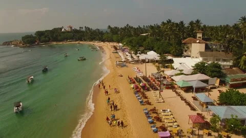 Flying over the crowded beach 2 Video stock 288234365