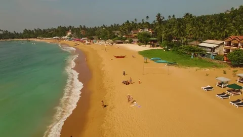 Flying over the crowded beach Stock-Footage 288234347
