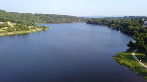 FLYING OVER A DAM SUNNY DAY Stock Footage 111578067